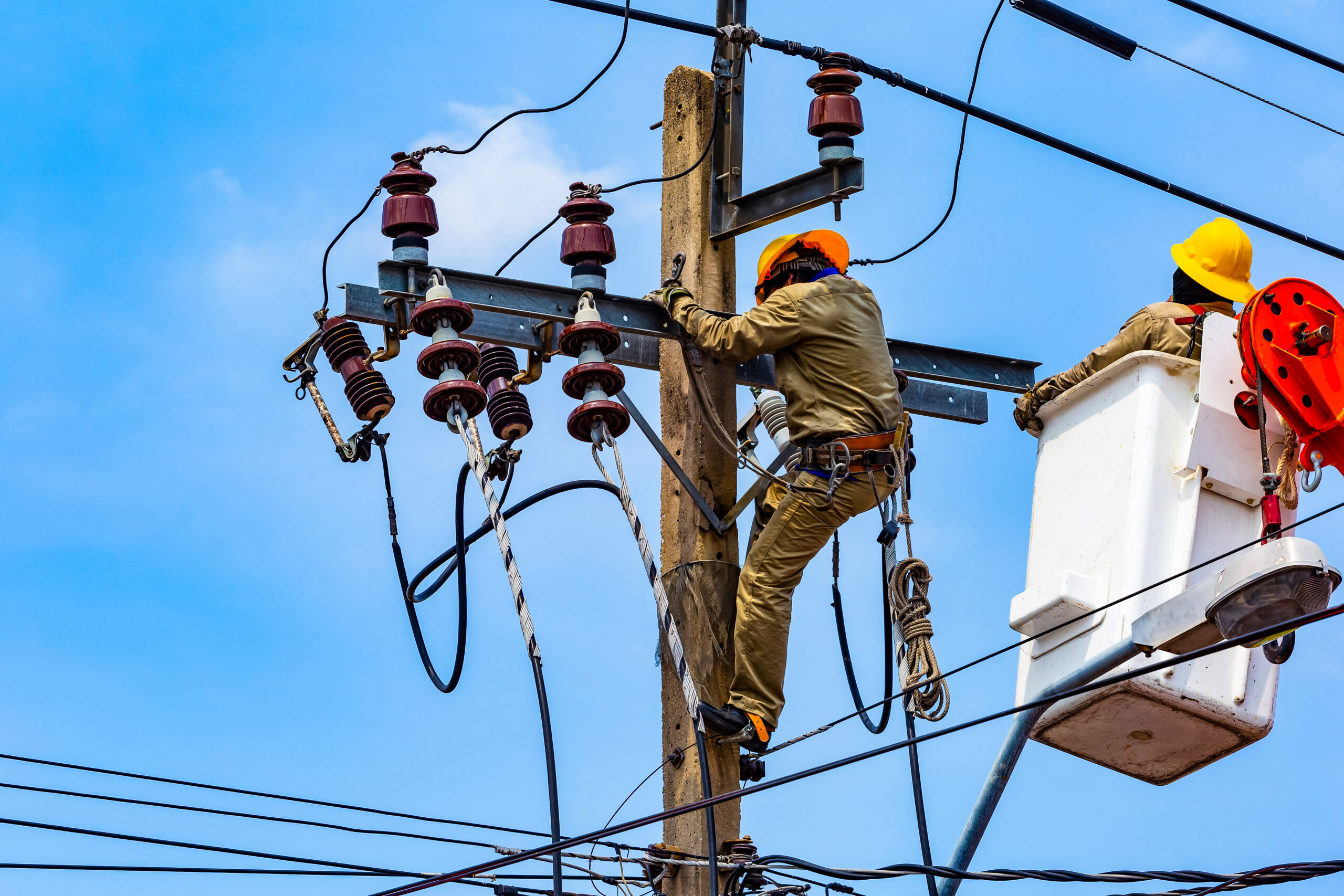 The electrical worker are repairing the electrical system